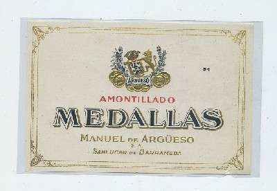 ETIQUETA VINO AMONTILLADO MEDALLAS. MANUEL DE ARGÜESO S.A. SANLUCAR BDA.