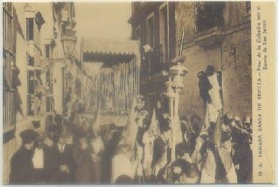POSTAL DE SEVILLA. REPRODUCCION. SEMANA SANTA. PASO DE COFRADIAS POR EL BARRIO SAN JULIAN