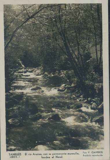 POSTAL DE SANILLES EL RIO ARANSA CON SU PERMANENTE MURMULLO BORDEA EL HOTEL