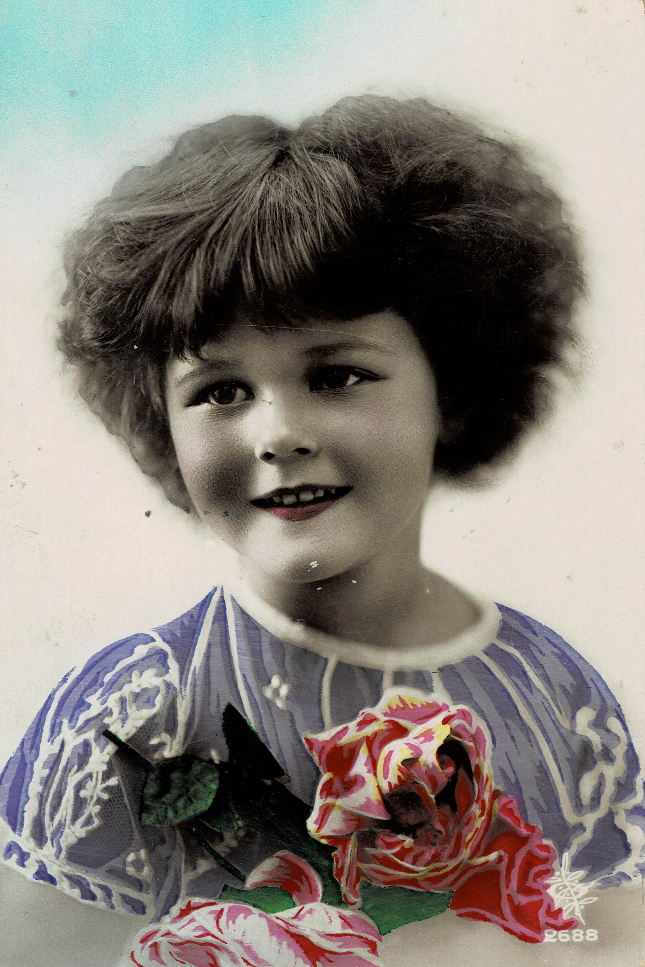 POSTAL NIÑA CON FLORES.